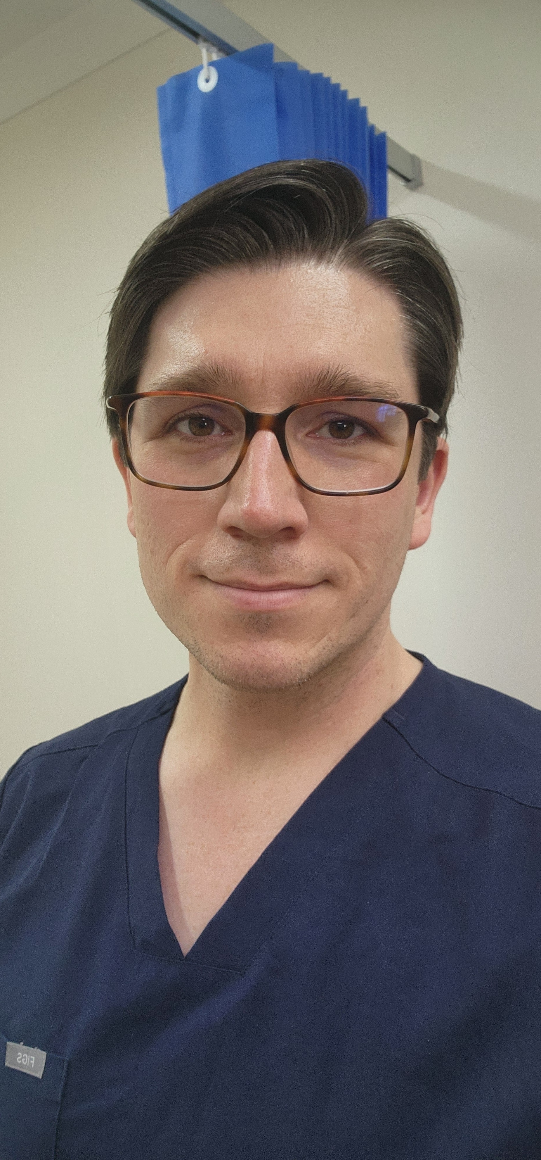 Dr Cameron Nottingham in clinic